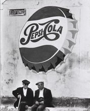 Course image of two men in front of a walled bottlecap